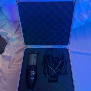 akg p220 microphone with stand, filter, extender, and carrying case